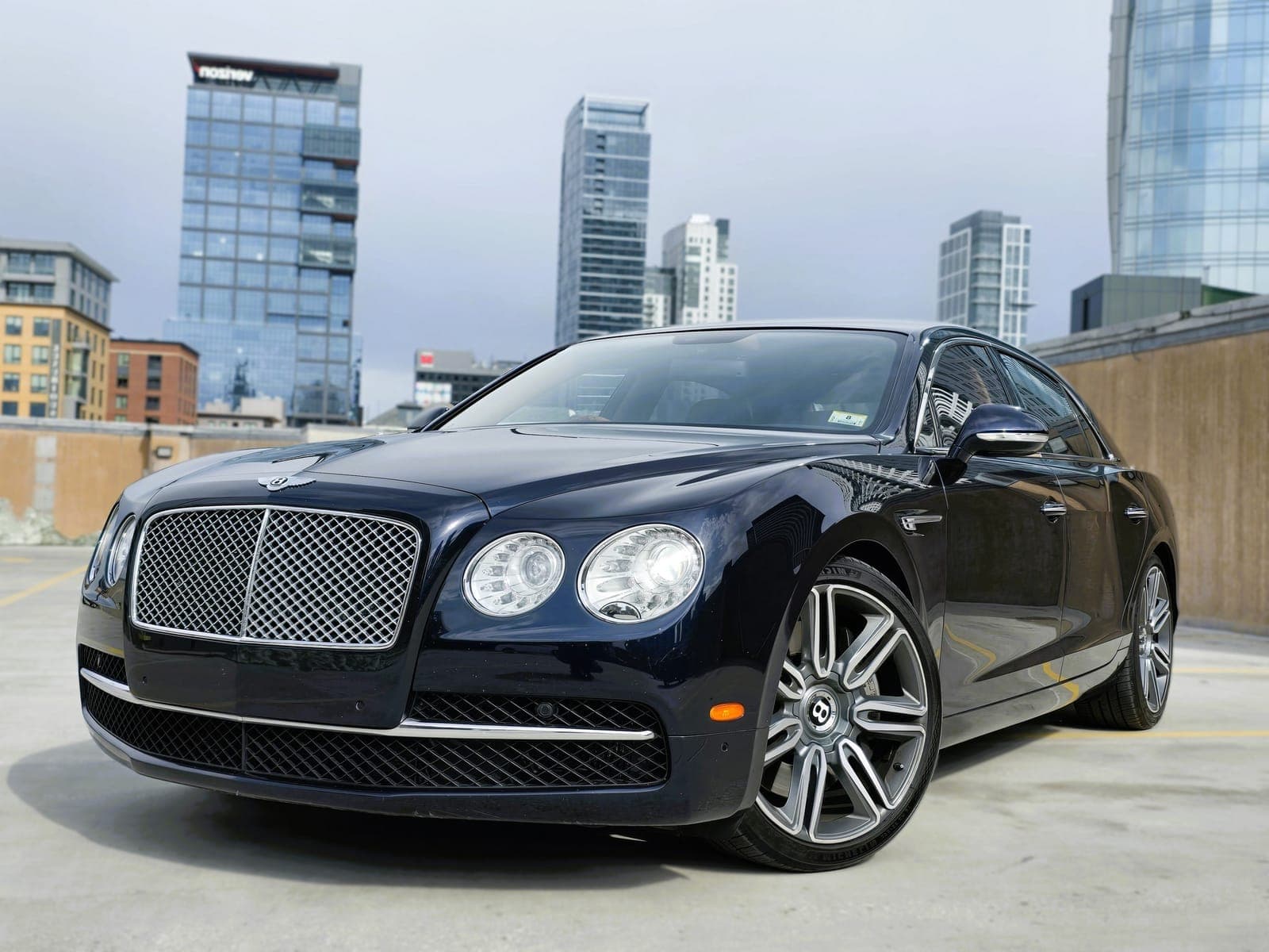 Black Bentley four-door sedan