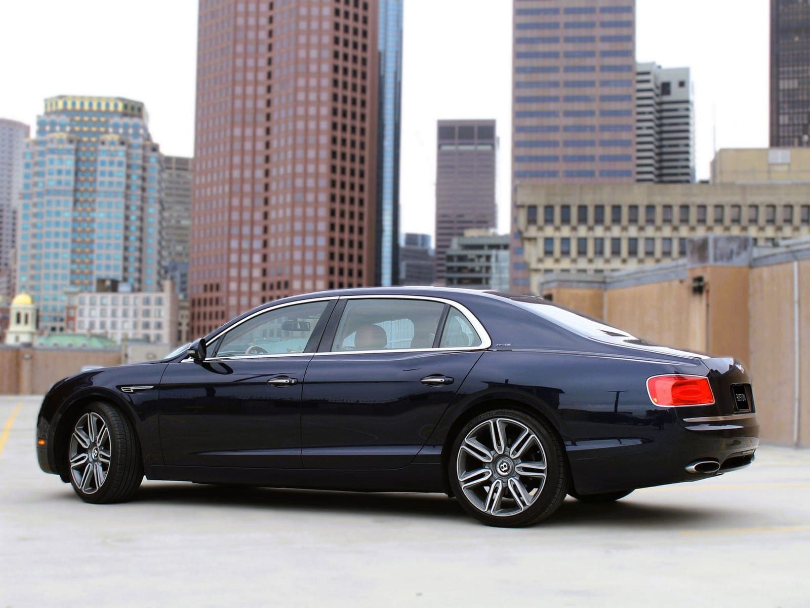 Black Bentley four-door sedan